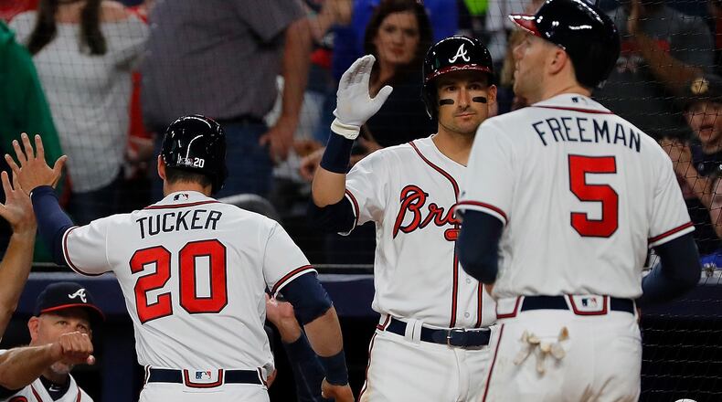 Preston Tucker of the Braves reacts after hitting a three-run homer in the first inning against the Washington Nationals that scored Freddie Freeman at SunTrust Park on April 3, 2018 in Atlanta. (Photo by Kevin C. Cox/Getty Images)