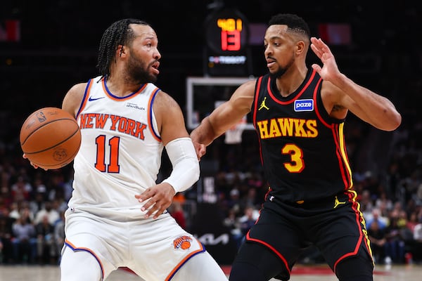 Hawks guard CJ McCollum (right) defends the Knicks’ Jalen Brunson during a recent matchup. (Colin Hubbard/AP)