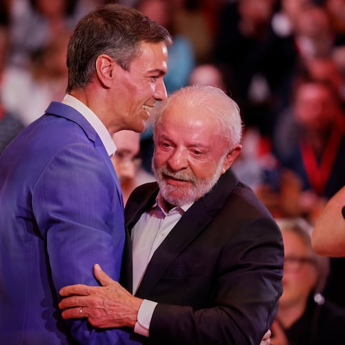 Spain's Prime Minister Pedro Sanchez, left, embraces Brazil's President Luiz Inacio Lula da Silva at the end of the Global Progressive Mobilisation summit in Barcelona, Spain, Saturday, April 18, 2026. (AP Photo/Joan Monfort)