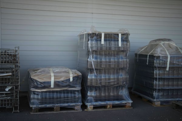 Bottles of Chablis wine are stored at the wine making facility of winegrower Vincent Dampt, in Chablis, Burgundy region, eastern France, Thursday, April 3, 2025. (AP Photo/Thibault Camus)