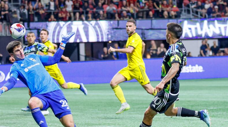 Columbus Crew goalkeeper Patrick Schulte (28) is unable to grab Atlanta United midfielder Thiago Almada’s (10) shot as he scored his team’s fourth goal during the second half against Columbus Crew in Game 2 of a first-round MLS playoff game at Mercedes-Benz Stadium on Tuesday, Nov. 7, 2023.
Miguel Martinez / miguel.martinezjimenez@ajc.com