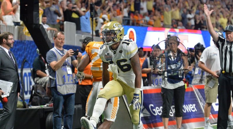Georgia Tech quarterback TaQuon Marshall (16) celebrates after he scored a touchdown at Mercedes-Benz Stadium on Monday, September 4, 2017. Tennessee won 42-41 over Georgia Tech in double overtime. HYOSUB SHIN / HSHIN@AJC.COM