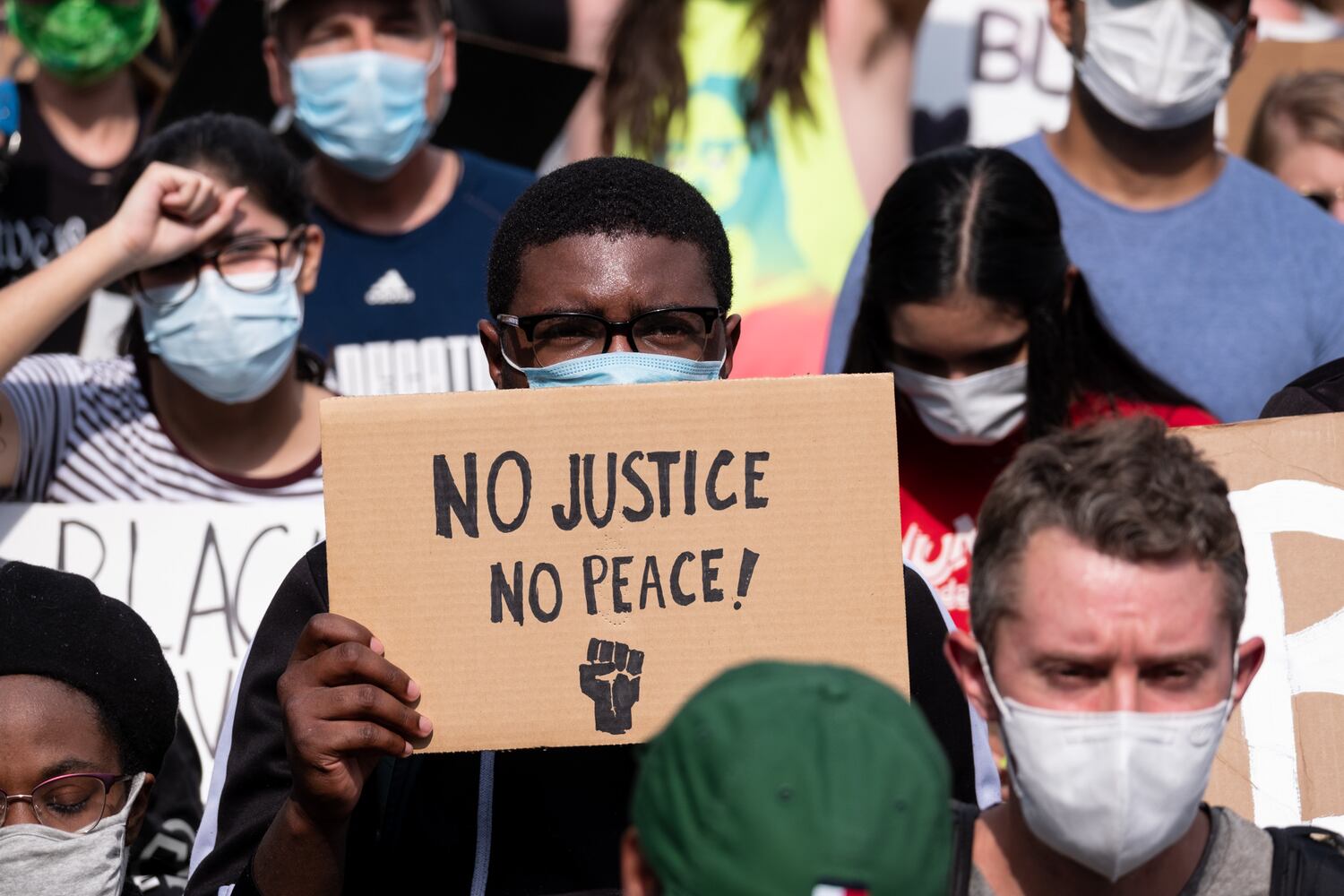 Behind the lens --  Protests: Taken FOR THE AJC
