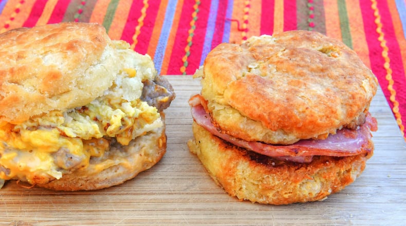 211127 Atlanta, Ga: L-R: Sausage Egg and Cheese Biscuit (gluten free), Ham Biscuit. Photos taken Saturday November 27, 2021 at Bomb Biscuits, 660 Irwin Street, Atlanta, Ga. 30312. For 120321GGdine for restaurant review. (Chris Hunt for The Atlanta Journal-Constitution)