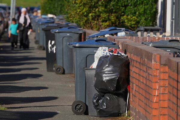 Rubbish piles up on a residential street in Birmingham, England, Monday, April 7, 2025, amid an ongoing refuse workers' strike in the city. (AP Photo/Kirsty Wigglesworth)