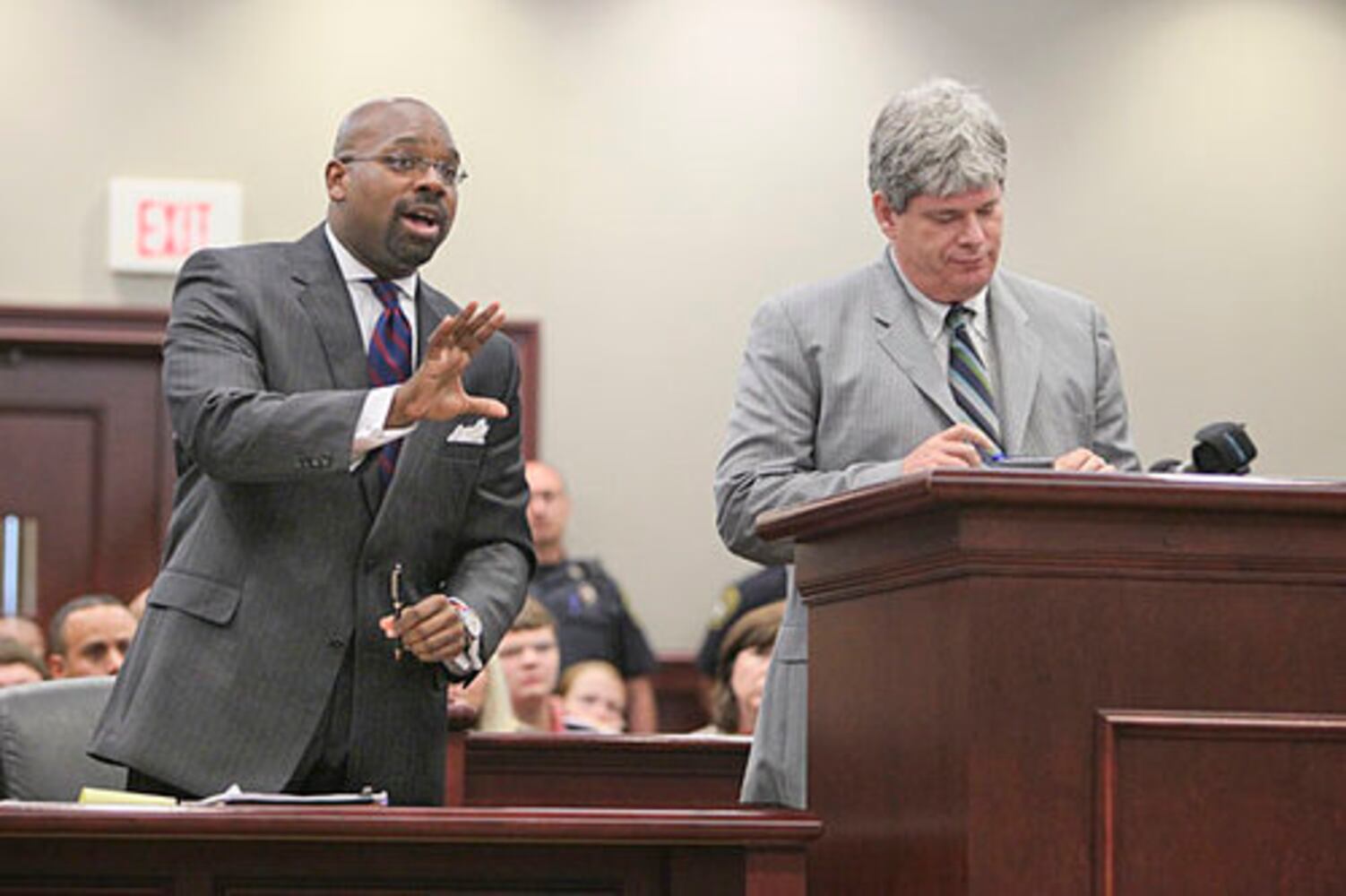 Teen in court, accused of killing cop