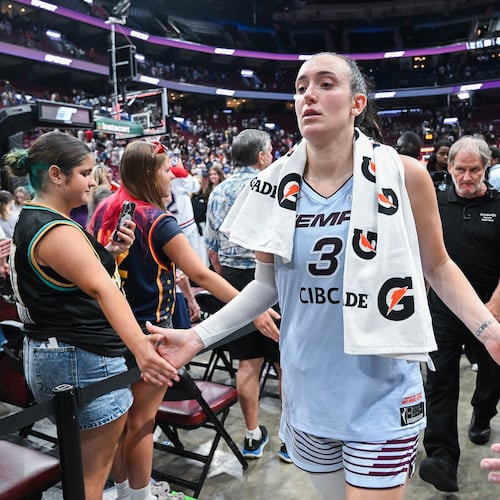 Toronto Tempo's Marina Mabrey (3) greets fans following her team's win over the New York Liberty in a WNBA basketball game in Montreal, Sunday, July 12, 2026. (Graham Hughes/The Canadian Press via AP)