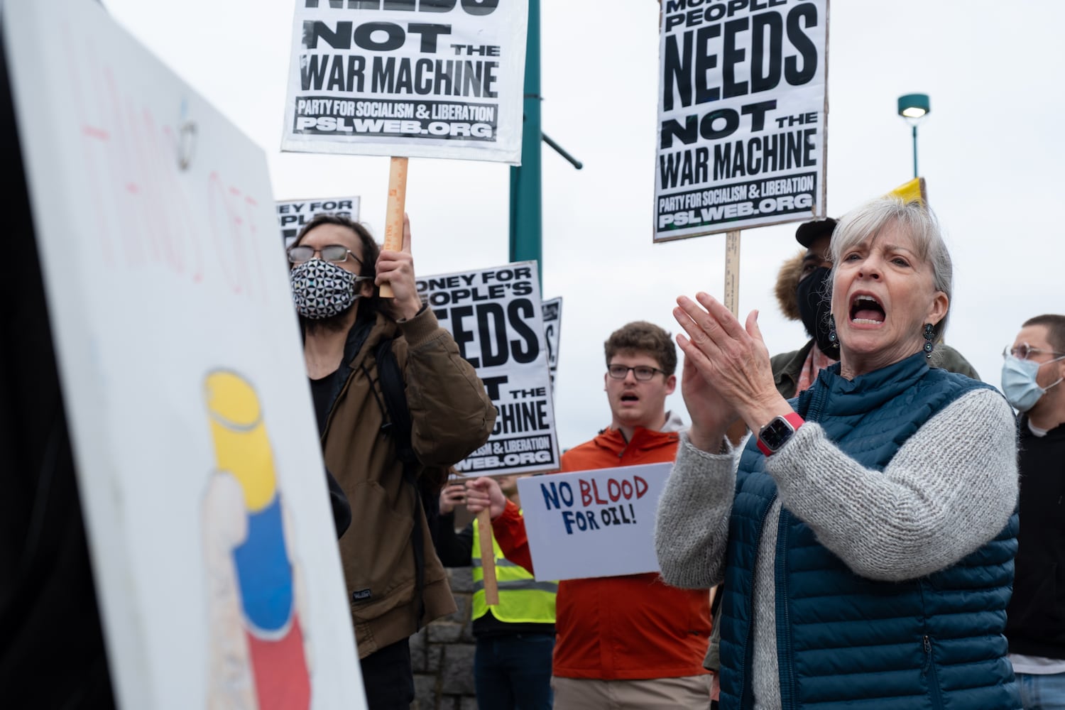 Linda Winter chants along during a protest in Atlanta on Saturday, Jan. 3, 2026, against the U.S. military action in Venezuela. (Ben Gray for the AJC)