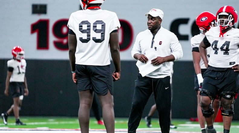 Georgia co-defensive coordinator and safeties coach Travaris Robinson oversees a defensive drill during the Bulldogs' spring practice session in Athens on Tuesday, March 12, 2024. (Tony Walsh/UGA Athletics)
