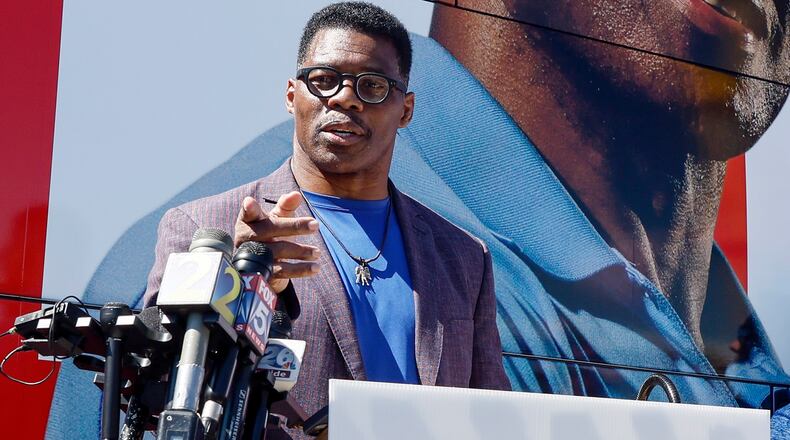 Republican U.S. Senate candidate Herschel Walker talks to the media at Battle Lumber Company in Wadley, Ga. on Thursday, October 6, 2022. (Natrice Miller/natrice.miller@ajc.com)