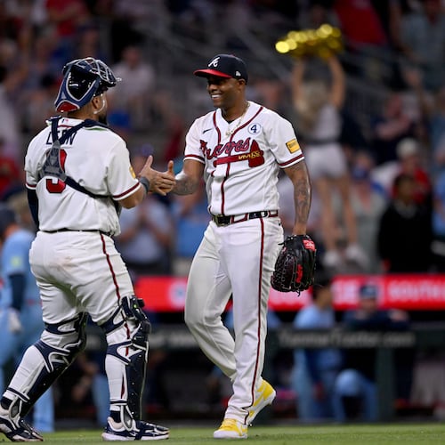 Braves pitcher Raisel Iglesias (right) celebrates with catcher Sandy León after a win against the Blue Jays at Truist Park on Tuesday, June 2, 2026, in Atlanta. (Hyosub Shin/AJC)