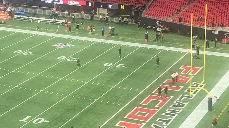 Pressbox view of some of the Falcons warming up before facing the Tennessee Titans at 1 p.m. Sunday, Sept. 29, 20019 at Mercedes-Benz Stadium. (By D. Orlando Ledbetter/dledbetter@ajc.com)