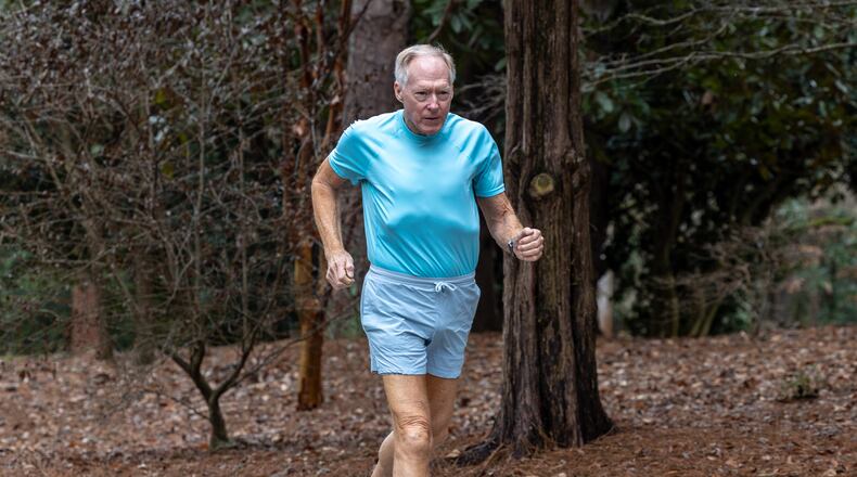 In December, Larry Guzy reached a record of running a 10K a day or the equivalent for 1,000 days.   PHIL SKINNER FOR THE ATLANTA JOURNAL-CONSTITUTION