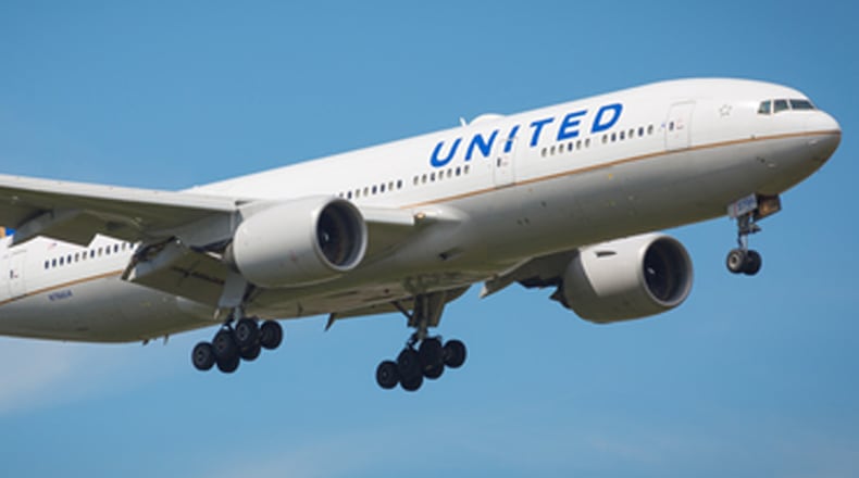 United Airlines flight attendants will begin September 1, 2018, to pitch passengers on a co-branded credit card. (Brett Critchley/Dreamstime/TNS)