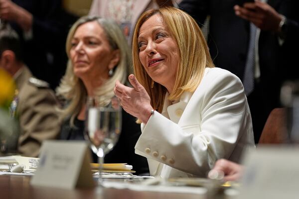 Italy's Prime Minister Giorgia Meloni speaks before a luncheon with President Donald Trump in the Cabinet Room of the White House, Thursday, April 17, 2025, in Washington. (AP Photo/Alex Brandon)