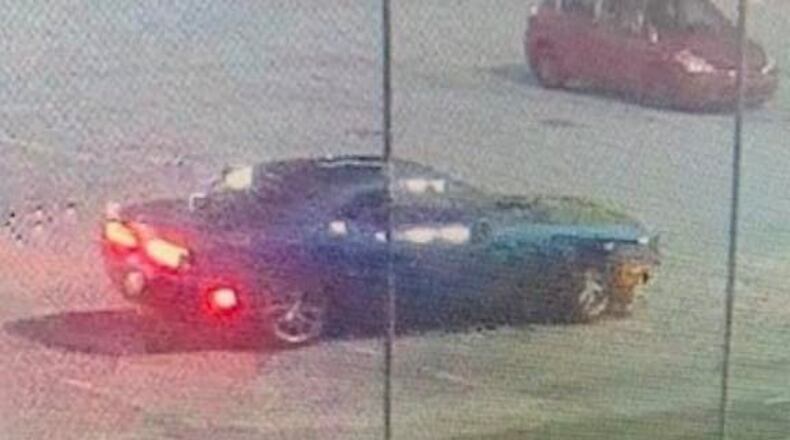 Investigators believe the driver of a blue Dodge Challenger helped the inmates escape last month from the Bibb County jail.