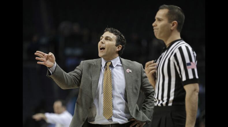 <p> Georgia Tech head coach Josh Pastner, left, directs his team against Notre Dame during the first half of an NCAA college basketball game in the Atlantic Coast Conference tournament in Charlotte, N.C., Tuesday, March 12, 2019. (AP Photo/Nell Redmond) </p>