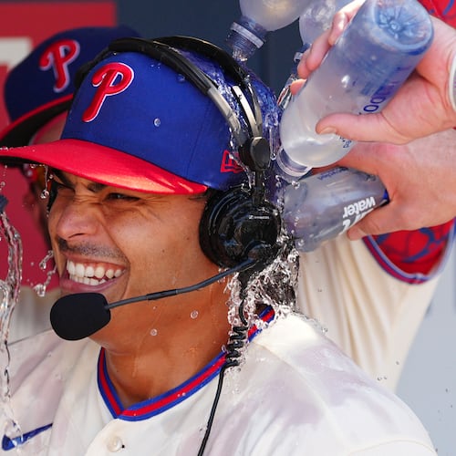 Philadelphia Phillies pitcher Jesús Luzardo is doused by teammates in the dugout after a baseball game against the Atlanta Braves, Monday, Sept. 7, 2026, in Philadelphia. (AP Photo/Derik Hamilton)