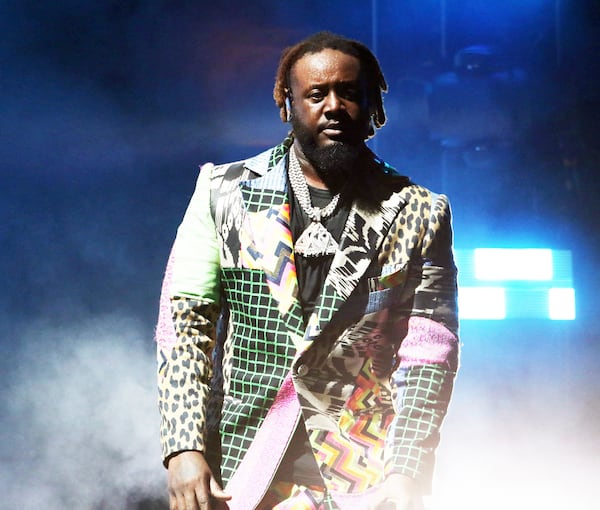 T-Pain — seen here during his "Mansion in Wiscansin Party Tour" stop at Lakewood Amphitheatre in June 2024 — alleges in a lawsuit that Konvict owes him nearly $500,000 under a 2005 recording agreement. (Robb Cohen for the AJC)