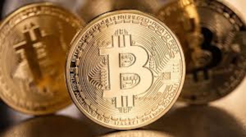 Police said scammers seeking bitcoin are operating in Alpharetta, Johns Creek and Roswell.