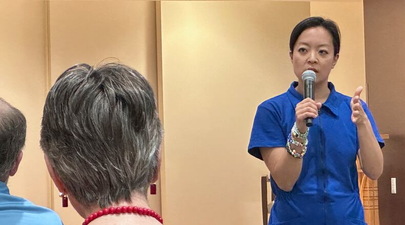 Francesca Hong, a Democratic socialist candidate for Wisconsin governor, speaks to voters at a retirement home, Tuesday, July 7, 2026, in Madison, Wis. (AP Photo/Scott Bauer)