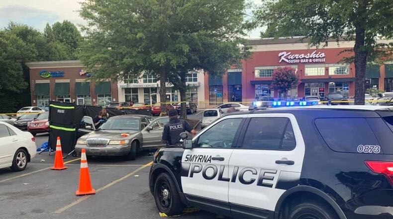 Police are searching for a suspect who reportedly killed two people Thursday afternoon near a popular Cobb County shopping center.