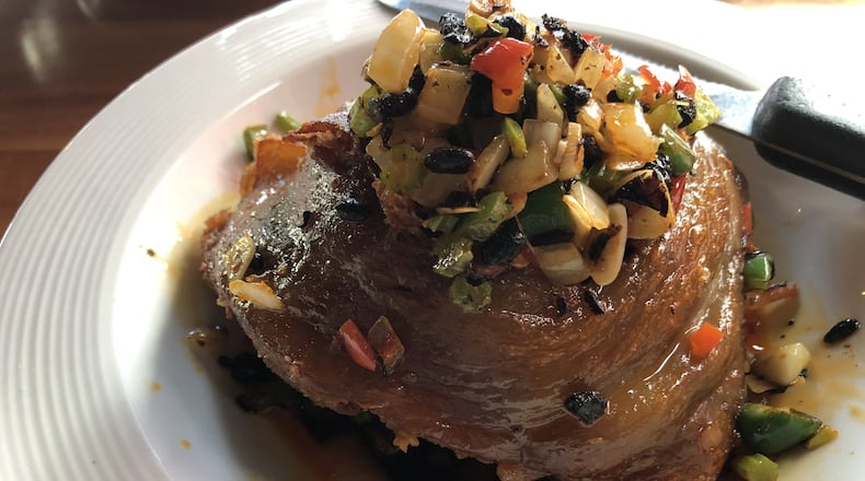 Our critic’s latest obsession: Spicy Pork Knuckle at Hai Authentic Chinese is a show-stopping mound of falling-apart tender ham hock encased in a layer of crispy skin. CONTRIBUTED BY WENDELL BROCK