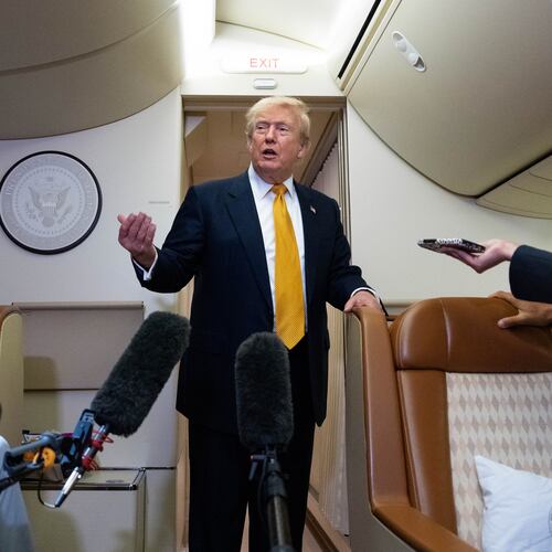 President Donald Trump speaks with reporters in flight on Air Force One after landing at U.S. Air Force Base at RAF Mildenhall, in Suffolk, Eastern England, Wednesday, July 8, 2026. (AP Photo/Alex Brandon)
