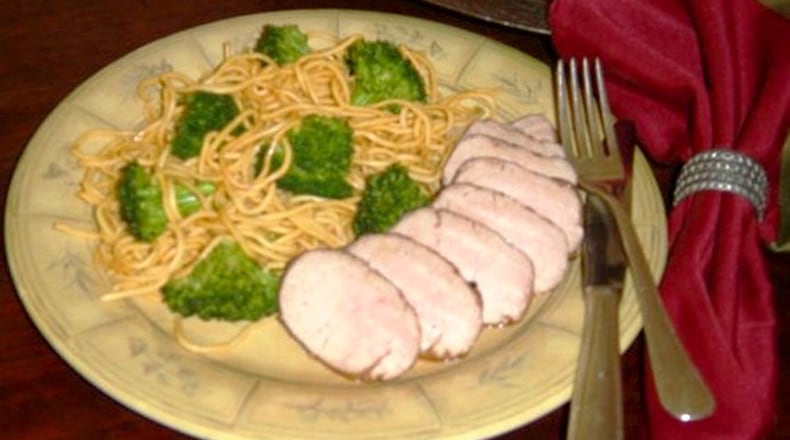 Asian-Flavored Pork Tenderloin with Stir-fried Broccoli and Noodles. (Linda Gassenheimer)