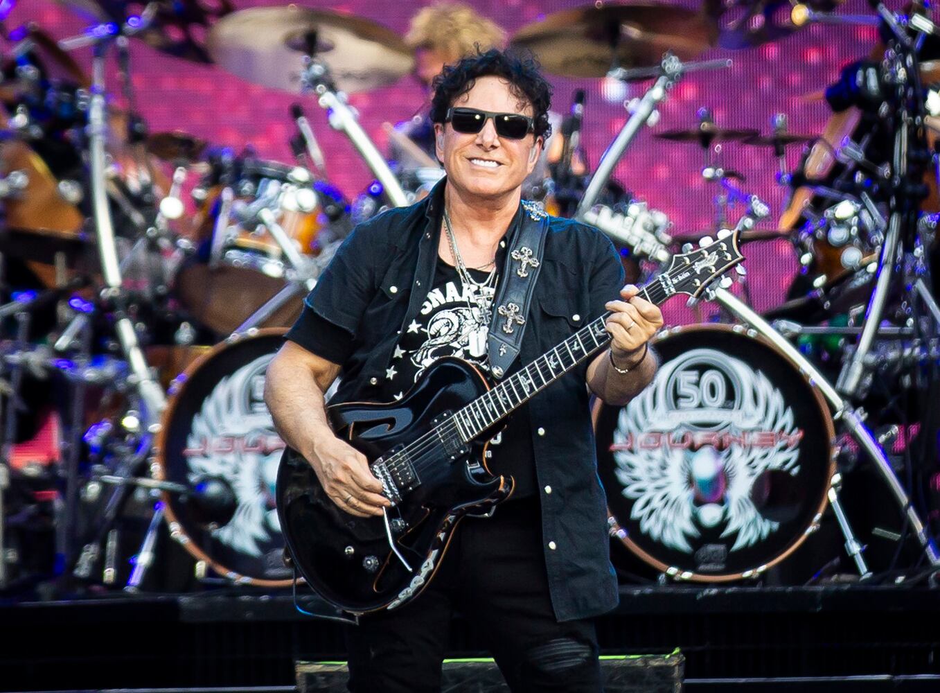 Journey blasted through their mega hits with Arnel Pineda commanding the crowd with his vocal chops at a concert with Def Leppard at Truist Park in Atlanta on July 13, 2024. (RYAN FLEISHER FOR THE ATLANTA JOURNAL-CONSTITUTION)