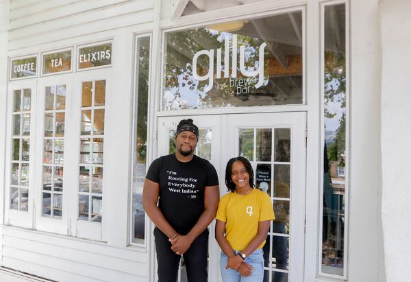 Daniel Brown, left, and Nephthaly Leonidas, right, pose for a portrait outside Gilly Brew Bar in Stone Mountain on Monday, Aug. 9, 2021. Brown and Leonidas opened the shop that honors their Caribbean heritage with menu items that are influenced by Caribbean food and culture. (Christine Tannous/AJC)