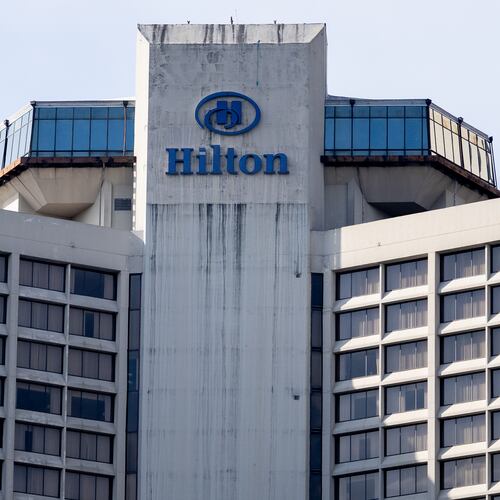 The Hilton Atlanta hotel building stands along Courtland Street in downtown Atlanta, Georgia. Thursday, March 13, 2025 (Ben Hendren for the Atlanta Journal-Constitution)