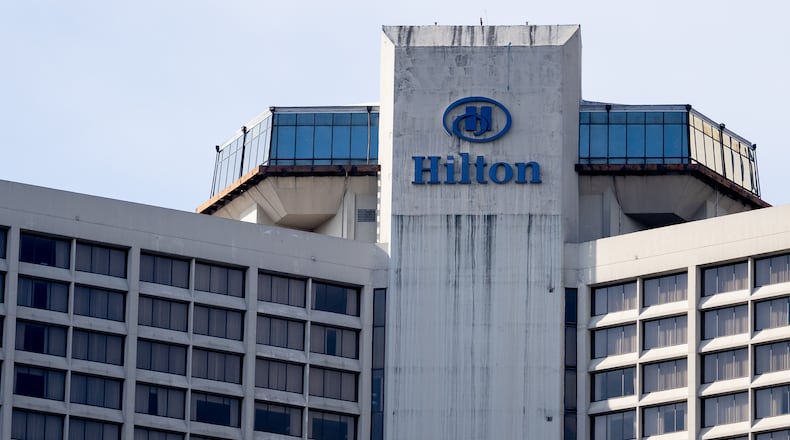 The Hilton Atlanta hotel building stands along Courtland Street in downtown Atlanta, Georgia. Thursday, March 13, 2025 (Ben Hendren for the Atlanta Journal-Constitution)