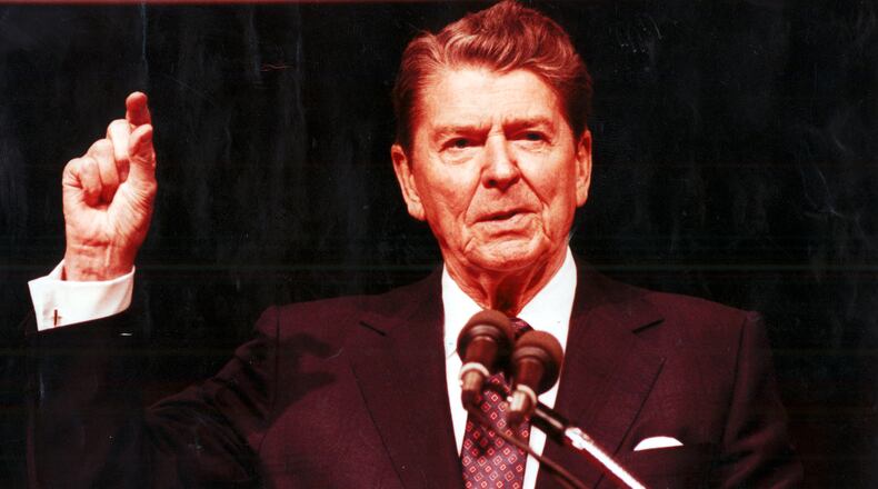 Feb. 10, 1990 - Former President Ronald Reagan address a crowd during the 1990 President's Day luncheon Saturday at the Georgia World Congress Center. (Wilfredo Lee/Special)