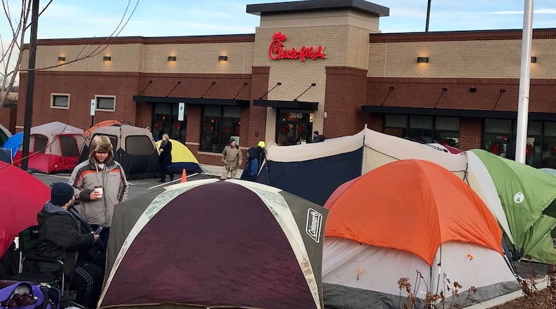 Customers, like the people in this file photo, can camp out for a chance at free Chick-fil-A for a year at a new Braselton location.