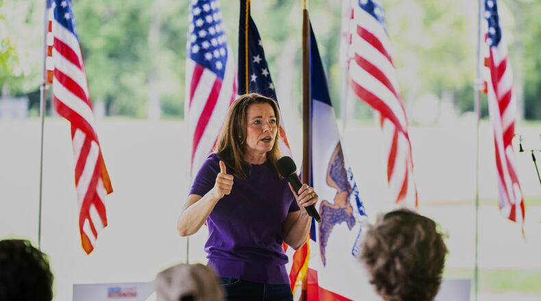 Christina Bohannan, Democratic candidate for U.S. House, speaks during the Scott County Democrats Annual Family Picnic, in Bettendorf, Iowa, Sunday, Aug. 16, 2026. (AP Photo/Joseph Cress)