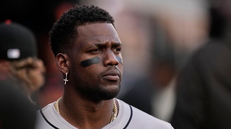 San Francisco Giants designated hitter Jorge Soler (2) looks out of the dugout before a baseball game against the Atlanta Braves, Wednesday, July 3, 2024, in Atlanta. (AP Photo/Brynn Anderson)