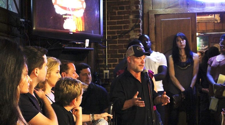 Michael Lucker in Manuel’s Tavern last year lecturing at an event for the Atlanta Film Festival. CONTRIBUTED BY LUCKY DOG FILMWORKS