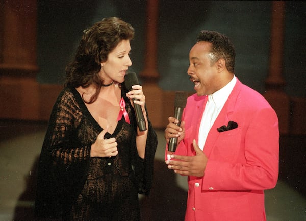 Celine Dion and Peabo Bryson perform the song "Beauty and the Beast," that won them the Grammy for best pop vocal performance by a group or duo, at the 35th annual Grammy Awards in Los Angeles, Feb. 25, 1993. (Reed Saxon/AP FILE)