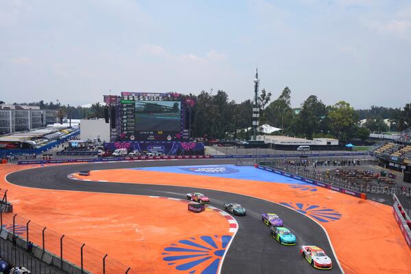 NASCAR Mexico cars drive through turn Th13 prior to a practice session for the NASCAR Cup Series auto race at the Hermanos Rodriguez race track in Mexico City, Friday, June 13, 2025. (AP Photo/Fernando Llano)