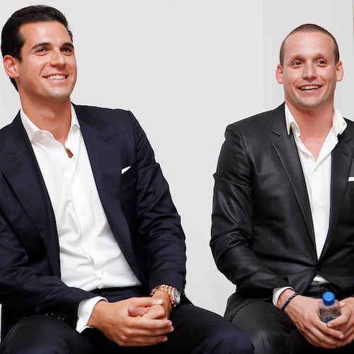 FILE - Oren Alexander and Tal Alexander speak at a panel at the Rockstars of Real Estate Event, Sept. 3, 2013 in New York. (Photo by Amy Sussman/Invision for DETAILS Magazine/AP Images, File)