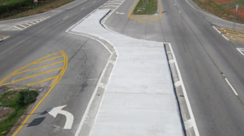 RCUT intersections utilize specialized medians like this one to block 'straight-through' and left-turning vehicles, ensuring all follow the natural flow of traffic and preventing accidents. (Courtesy Georgia DOT)