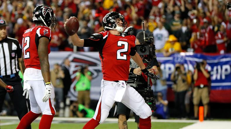 Matt Ryan #2 of the Atlanta Falcons celebrates after running for a 14 yard touchdown in the second quarter against the Green Bay Packers in the NFC Championship Game at the Georgia Dome on January 22, 2017 in Atlanta, Georgia. (Photo by Kevin C. Cox/Getty Images)