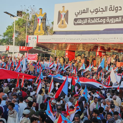 Supporters of the Southern Transitional Council (STC), a coalition of separatist groups seeking to restore the state of South Yemen, hold South Yemen flags during a rally, in Aden, Yemen, Dec. 25, 2025. Arabic reads, "announcement of South Arab state". (AP Photo)