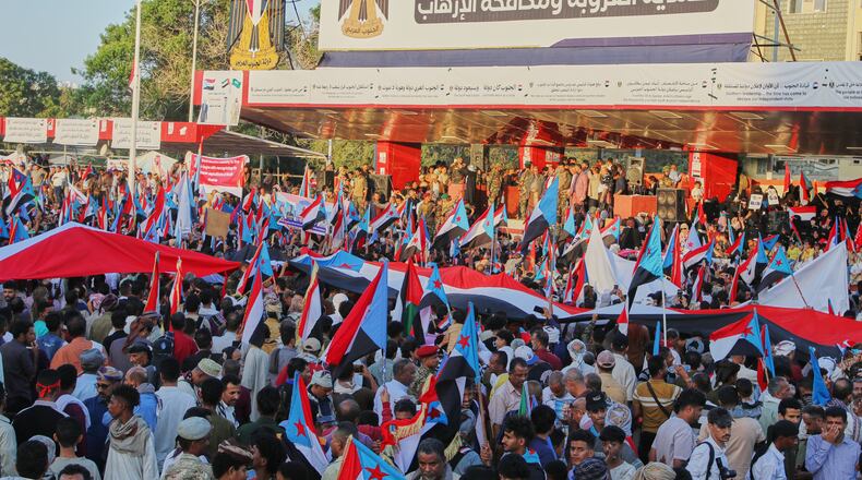 Supporters of the Southern Transitional Council (STC), a coalition of separatist groups seeking to restore the state of South Yemen, hold South Yemen flags during a rally, in Aden, Yemen, Dec. 25, 2025. Arabic reads, "announcement of South Arab state". (AP Photo)