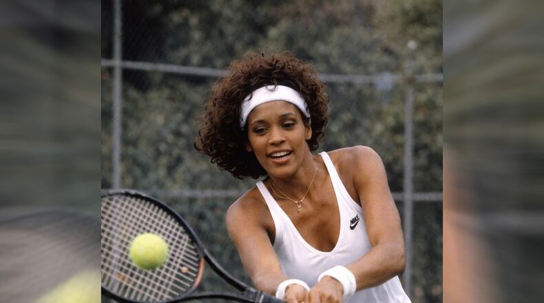 Singer Whitney Houston playing tennis. The Whitney E. Houston Legacy Foundation and Primary Wave Music plan the first Annual Whitney E. Houston Pickleball Tournament in Alpharetta. (Courtesy of The Estate of Whitney E. Houston)