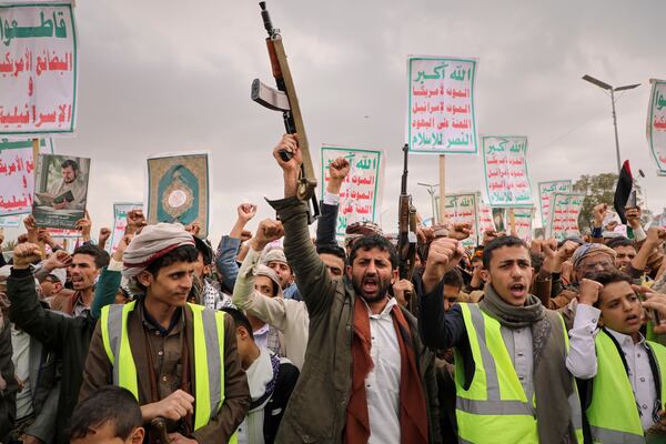 Houthi supporters chant slogans during a weekly anti-U.S. and anti-Israel rally in Sanaa, Yemen, Friday March, 28, 2025. (AP Photo/Osamah Abdulrahman)