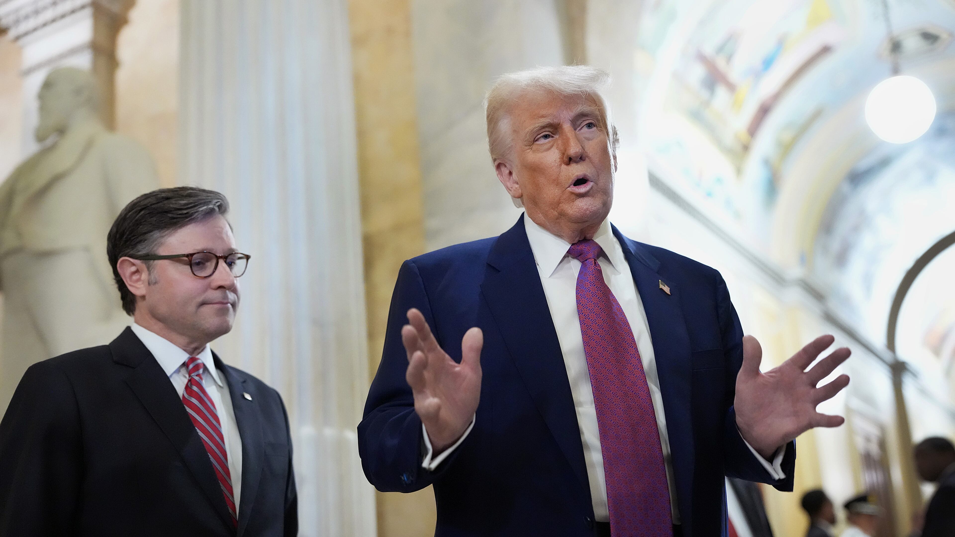 House Speaker Mike Johnson (left) and President Donald Trump discuss the Republican-backed budget at the U.S. Capitol on May 20, 2025, in Washington, D.C. Trump joined conservative House lawmakers to help push through their budget bill after it advanced through the House Budget Committee on May 18. (Kevin Dietsch/TNS)