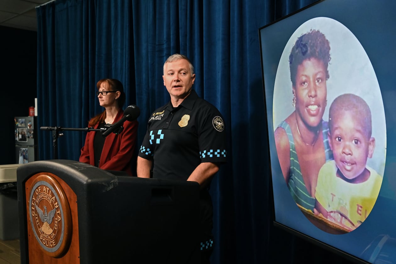 Atlanta police Lt. Christapher Butler and detective Summer Benton announce the arrest of Bridgett Lockhart's boyfriend nearly 27 years after she was killed. (Hyosub Shin/AJC)