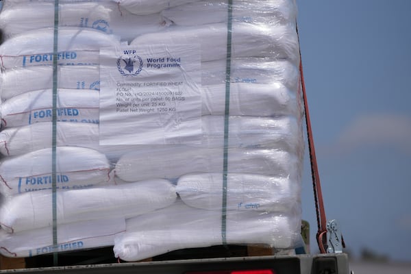 Trucks carrying humanitarian aid for the Gaza Strip are seen at the Kerem Shalom Crossing in southern Israel, Monday, May 19, 2025. A day after Israel said it would resume allowing aid into the territory. (AP Photo/Ohad Zwigenberg)